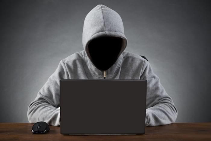 Hacker Using Laptop