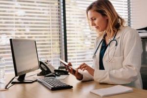 Doctor accessing an EHR from her tablet