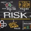 risk management concept hand drawn on chalkboard