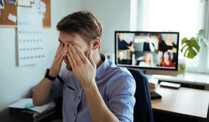Man feeling burnout from work stress.