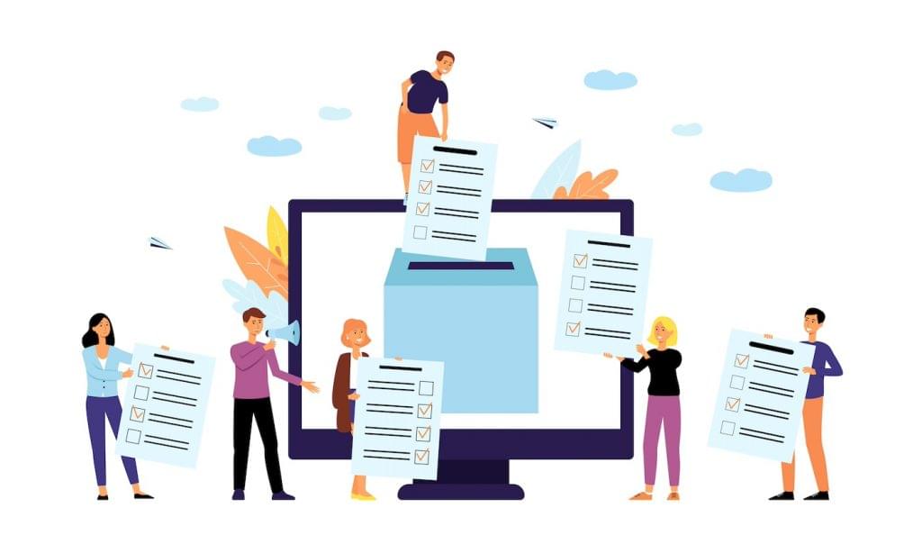 Illustration of employees around a computer screen with large forms in their hands working together to put them in a submission box. Represents employee survey tools.
